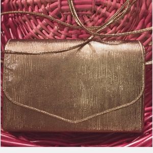 Richmark copper colored small purse with mirror inside
